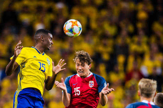 Alexander Isak of Sweden and Sander Berge of Norway