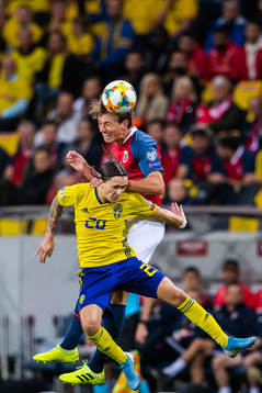 Kristoffer Olsson of Sweden and Sander Berge of Norway