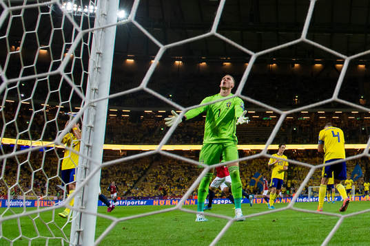 Goalkeeper Robin Olsen of Sweden reacts