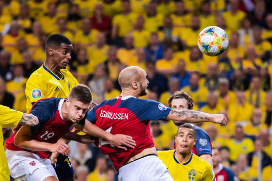 Alexander Isak of Sweden against Markus Henriksen and Tore