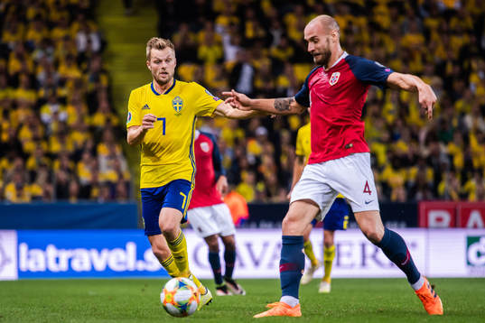 Sebastian Larsson of Sweden and Tore Reginiussen of Norway