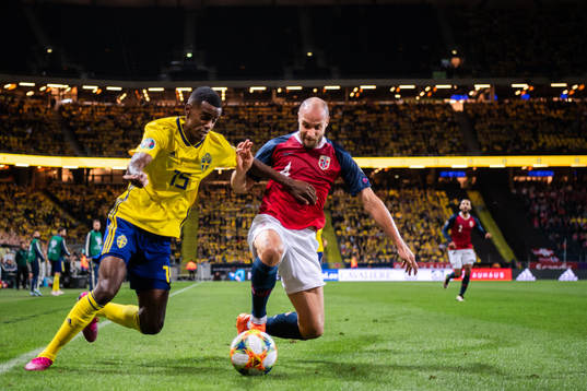 Alexander Isak of Sweden and Tore Reginiussen of Norway