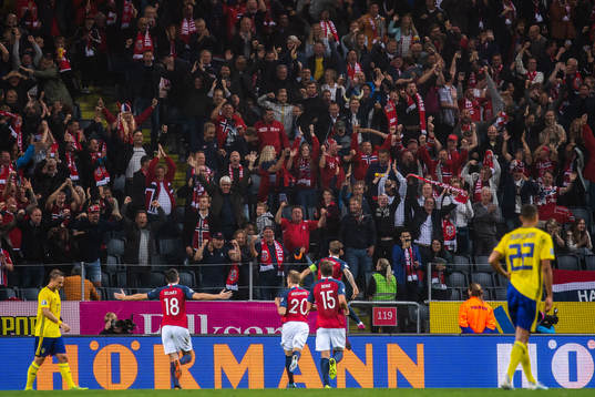 Supporters of Norway celebrate