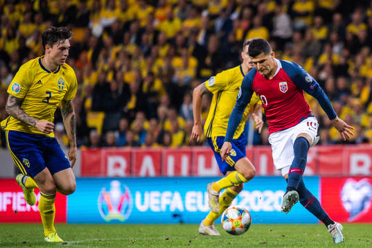 Victor Nilsson Lindelöf of Sweden and Tarik Elyounoussi of