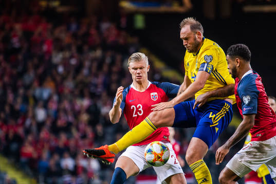 Andreas Granqvist of Sweden against Erling Braut Haaland