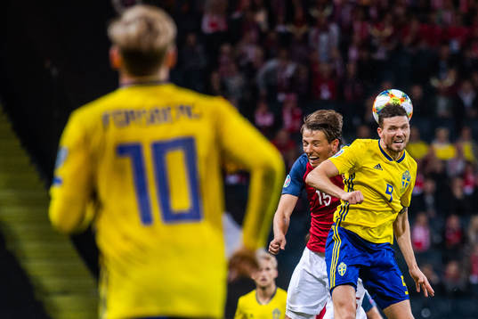 Sander Berge of Norway and Marcus Berg of Sweden