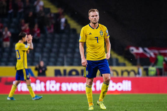 Sebastian Larsson of Sweden looks dejected