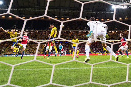 Robin Quaison of Sweden with a header