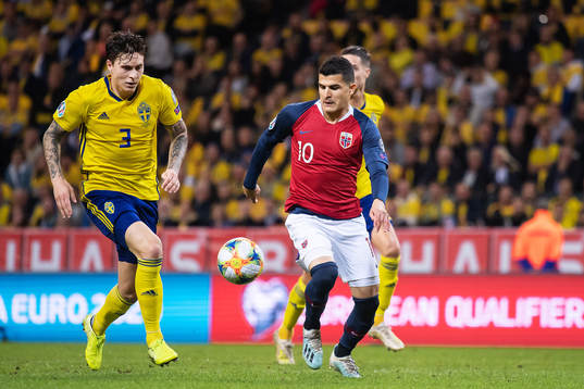 Victor Nilsson Lindelöf of Sweden and Tarik Elyounoussi of