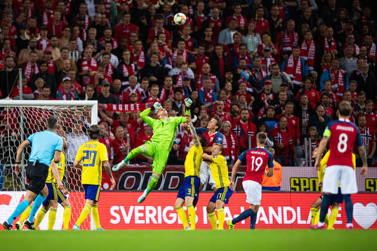 goalkeeper Robin Olsen of Sweden clears the ball