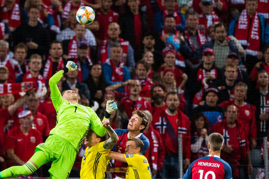 goalkeeper Robin Olsen of Sweden clears the ball