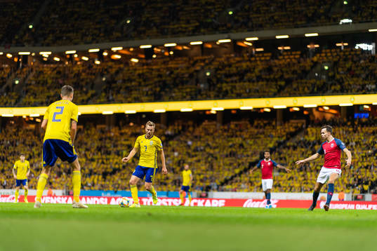 Mikael Lustig and Sebastian Larsson against Stefan Johansen