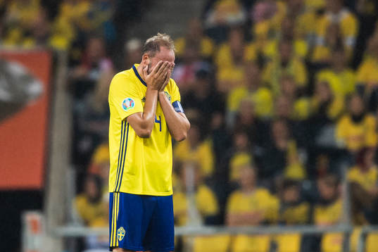 Andreas Granqvist of Sweden looks dejected