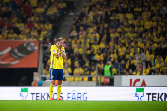 Andreas Granqvist of Sweden looks dejected