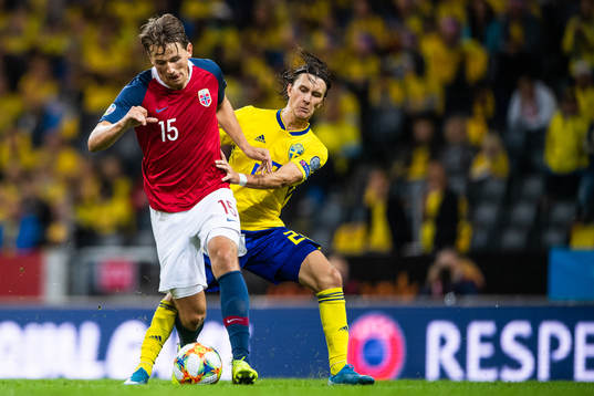 Sander Berge of Norway and Kristoffer Olsson of Sweden