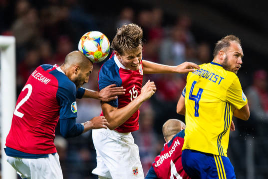 Haitam Aleesami and Sander Berge compete for the ball with