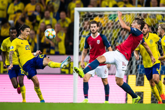 Kristoffer Olsson of Sweden and Sander Berge of Norway