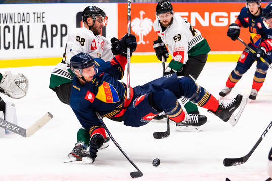 Anton Hedman of Djurgården falls when competing for the
