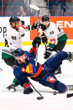 Anton Hedman of Djurgården falls when competing for the