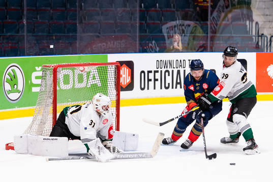 Goalkeeper John Murray and Aliksandr Yeronau defend against