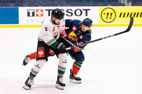Filip Komorski of GKS Tychy and Manuel Ågren of