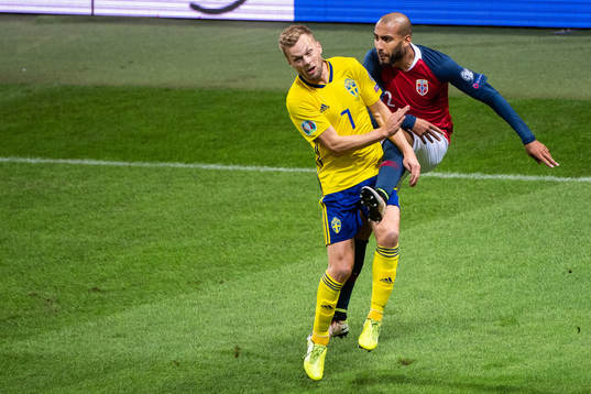 Sebastian Larsson of Sweden and Haitam Aleesami of Norway
