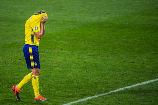 Andreas Granqvist of Sweden looks dejected