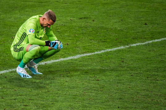 Goalkeeper Robin Olsen of Sweden looks dejected