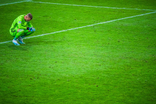 Goalkeeper Robin Olsen of Sweden looks dejected