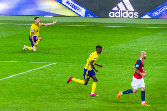 Mikael Lustig of Sweden reacts