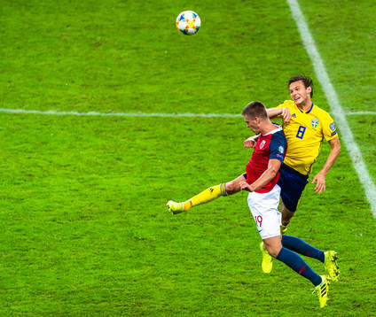 Markus Henriksen of Norway and Albin Ekdal of Sweden