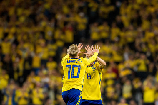 Emil Forsberg of Sweden celebrates with teammate Albin Ekdal