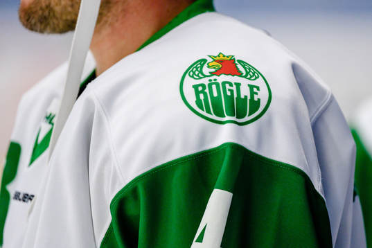 Rögles klubbmärke på tröja