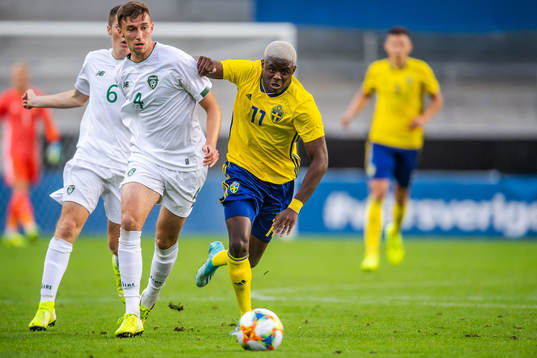 Conor Masterson of Ireland and Benjamin Mbunga Kimpioka of