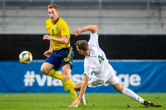 Dejan Kulusevski of Sweden and Conor Masterson of Ireland