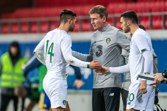 Daniel Mandroiu changes with Troy Parrott of Ireland
