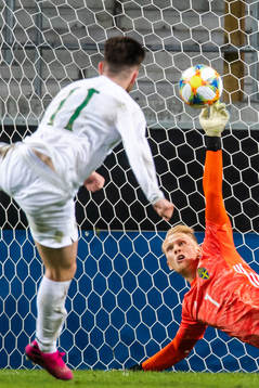 Goalkeeper Pontus Dahlberg of Sweden saves a penalty from