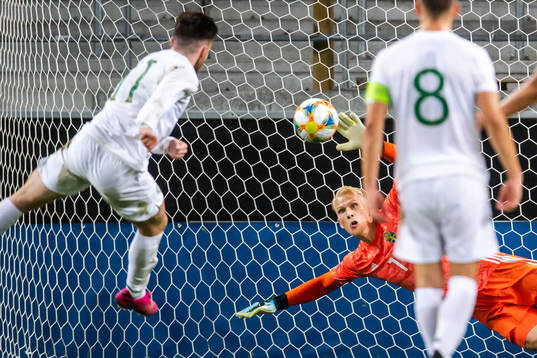 Goalkeeper Pontus Dahlberg of Sweden saves a penalty from