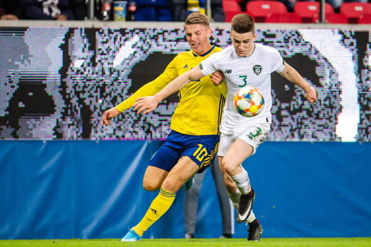 Viktor Gyökeres of Sweden and Darragh Leahy of Ireland
