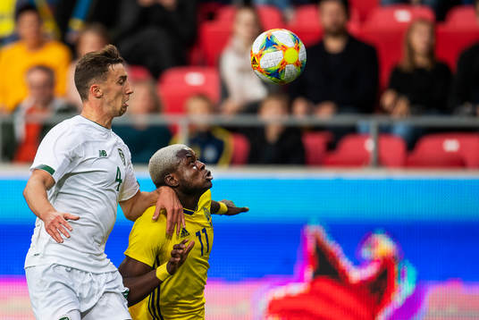 Benjamin Mbunga Kimpioka of Sweden and Conor Masterson of