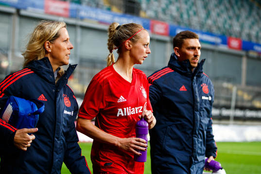 Amanda Ilestedt of Bayern Munich receives medical treatment