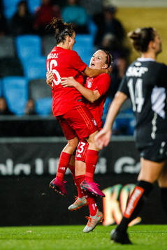 Lina Magull  and  Mandy Islacker of Bayern Munich celebrate
