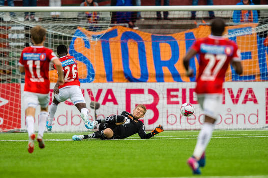 Shuaibu Lalle Ibrahim of Kongsvinger and Goalkeeper Andreas