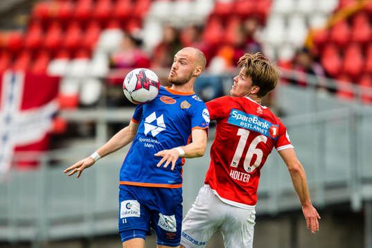 Aron Elis Thrandarson of Aalesund and Harald Holter of