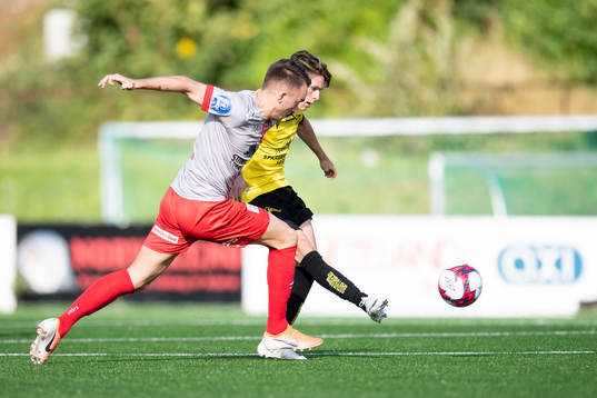 Victor Grodås of Strømmen and Kasper Skaanes of Start