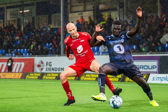 Ruben Kristiansen of Brann and Aliou Coly of Kristiansund