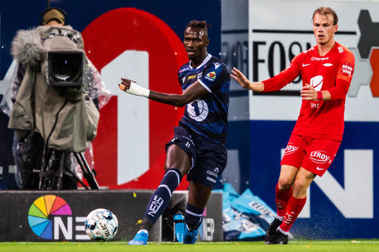 Amidou Diop of Kristiansund and Petter Dahle Strand of Brann