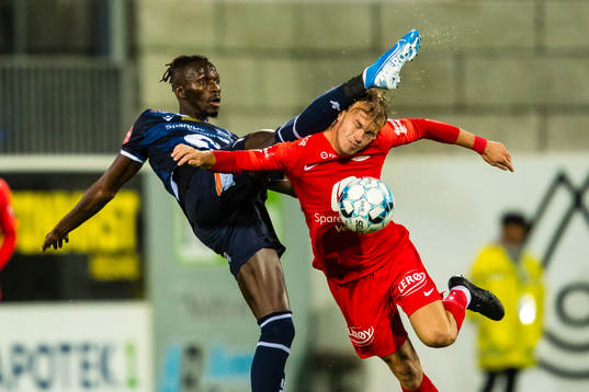 Amidou Diop of Kristiansund and Petter Dahle Strand of Brann