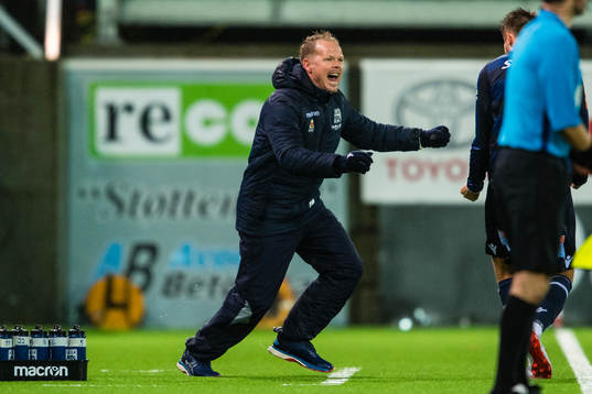 Christian Michelsen, head coach of Kristiansund,  celebrates