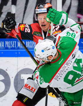 Malmö Redhawks Lars Bryggman och Rögles Eric Gelinas
